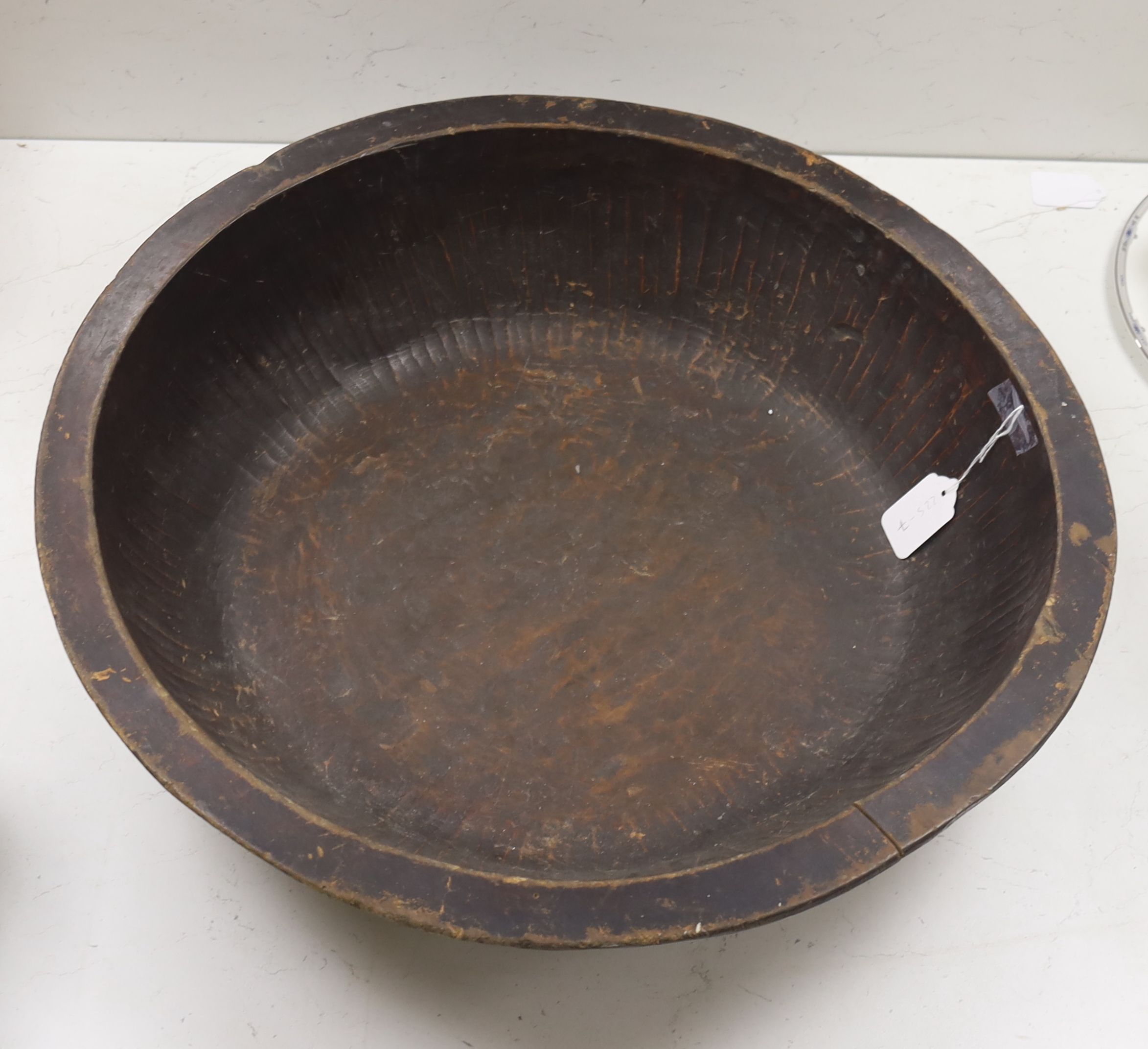 A large hewn bowl, diameter 58cm